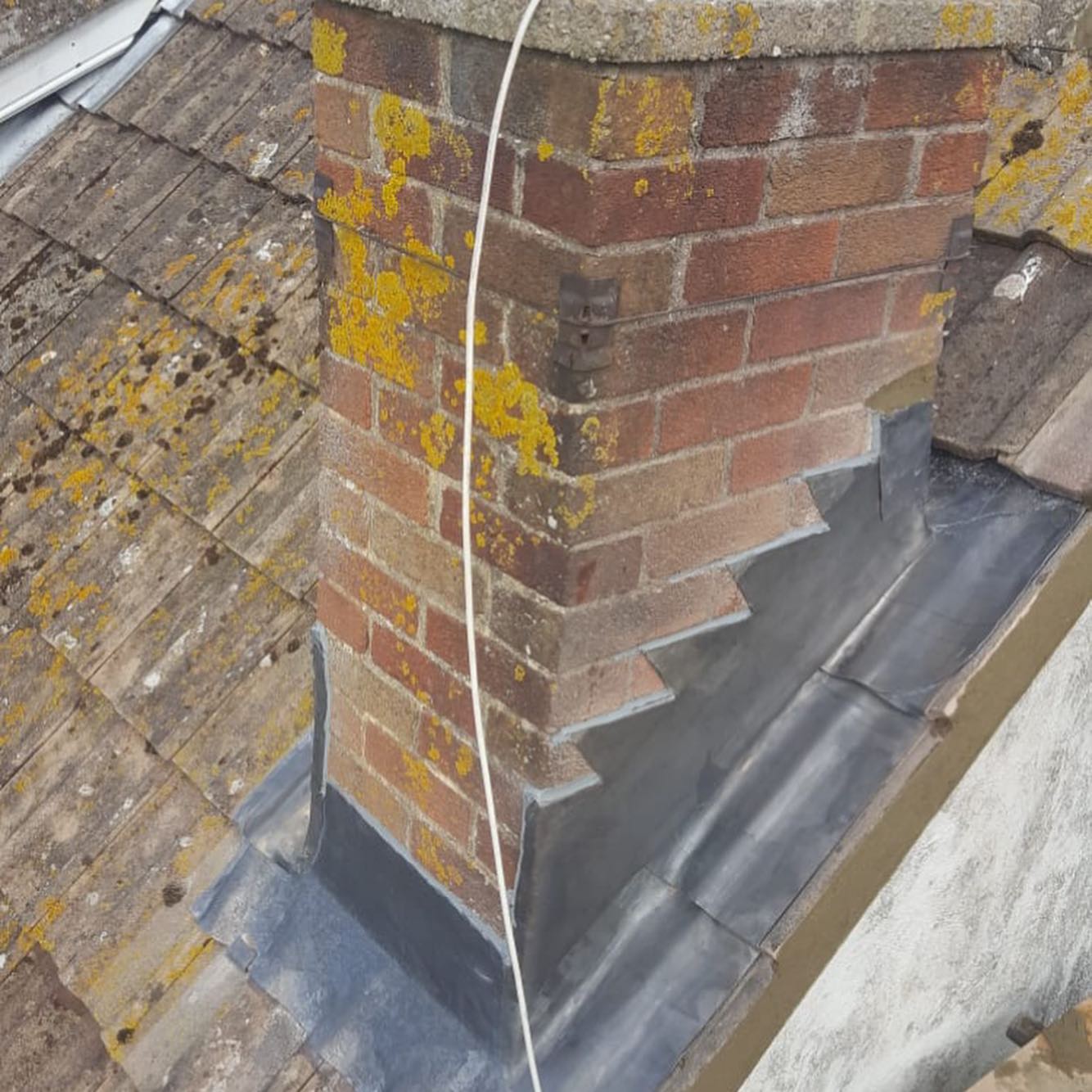 Bath chimney repair with new flashing